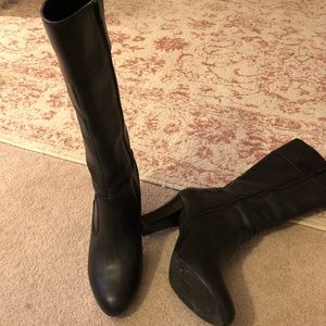 Mid calf black heeled leather boots